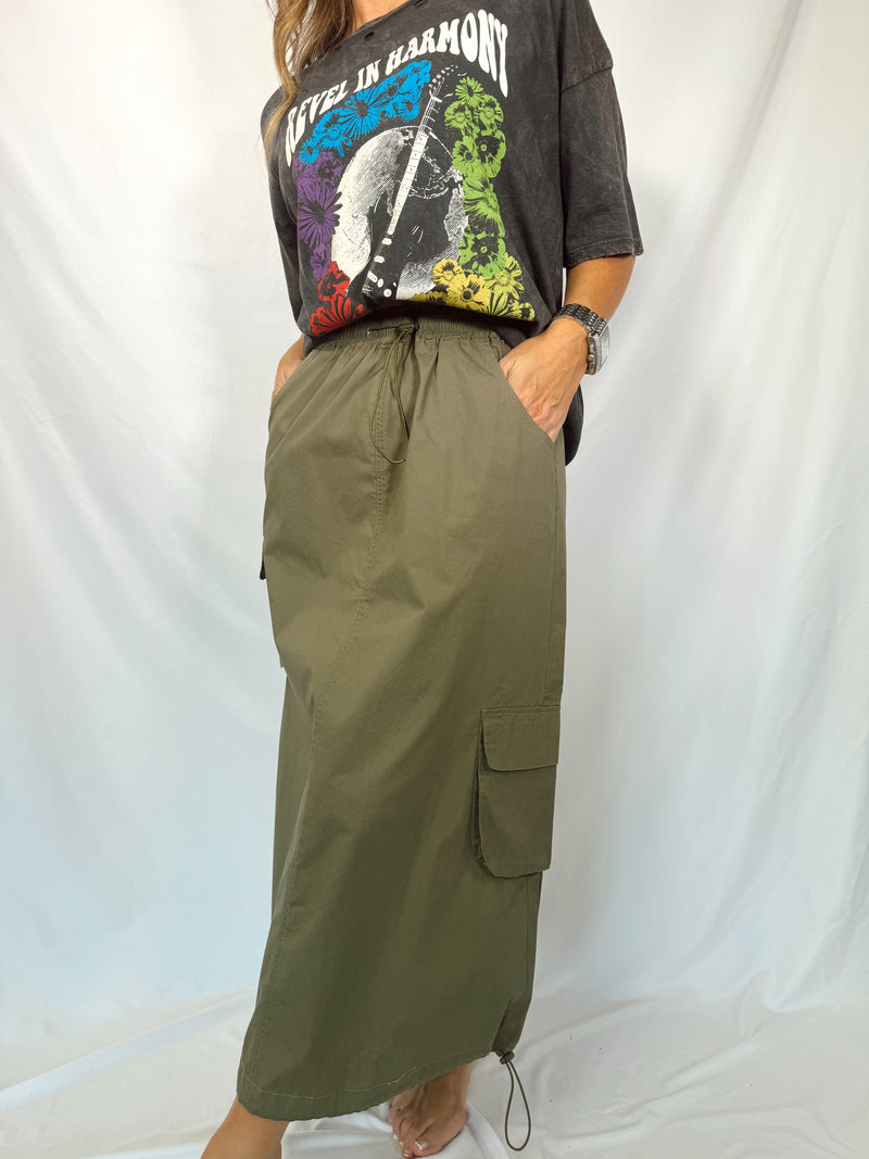 Girl in skirt-parachute skirt-green skirt-cargo style skirt-cargo skirt